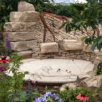Big rocks-boulders to create a seating in the garden